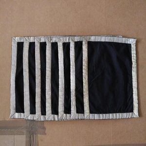 SET OF 7 STRIKING BLACK PLACEMATS WITH GOLD BORDER